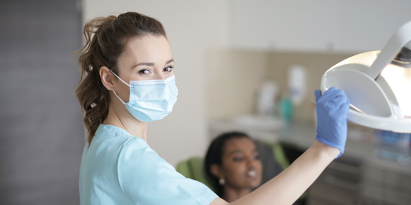 Female dentist.